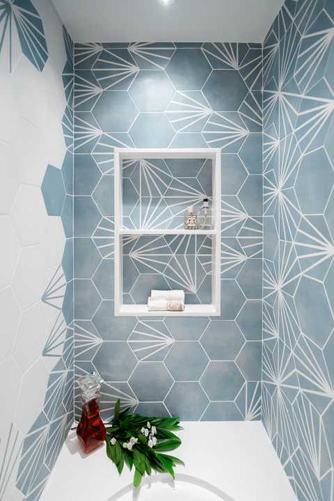 blue and white tile shower