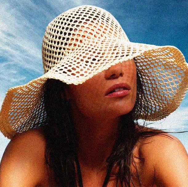 woman wearing a beach hat