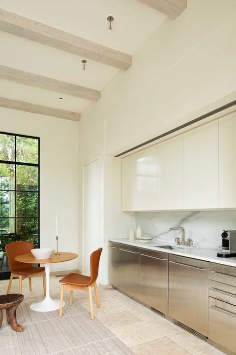 kitchen, stainless steel cabinets, marble countertop and marble backplast, stainless steel faucet