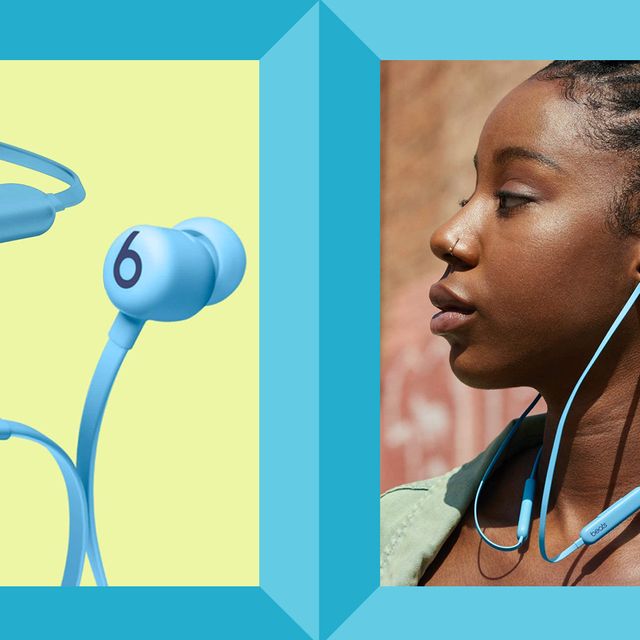 person wearing light blue beats flex wireless earbuds