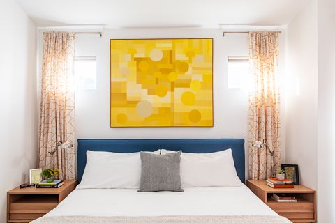 bedroom decorating ideas, bedroom with yellow artwork above headboard