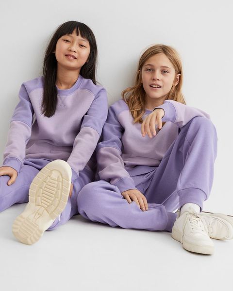 Girls in a purple jogging suit