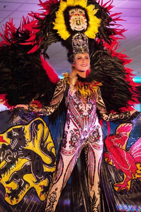 Carnival, Event, Festival, Tradition, Costume, Headgear, Samba, Feather, Costume design, Performance art, 