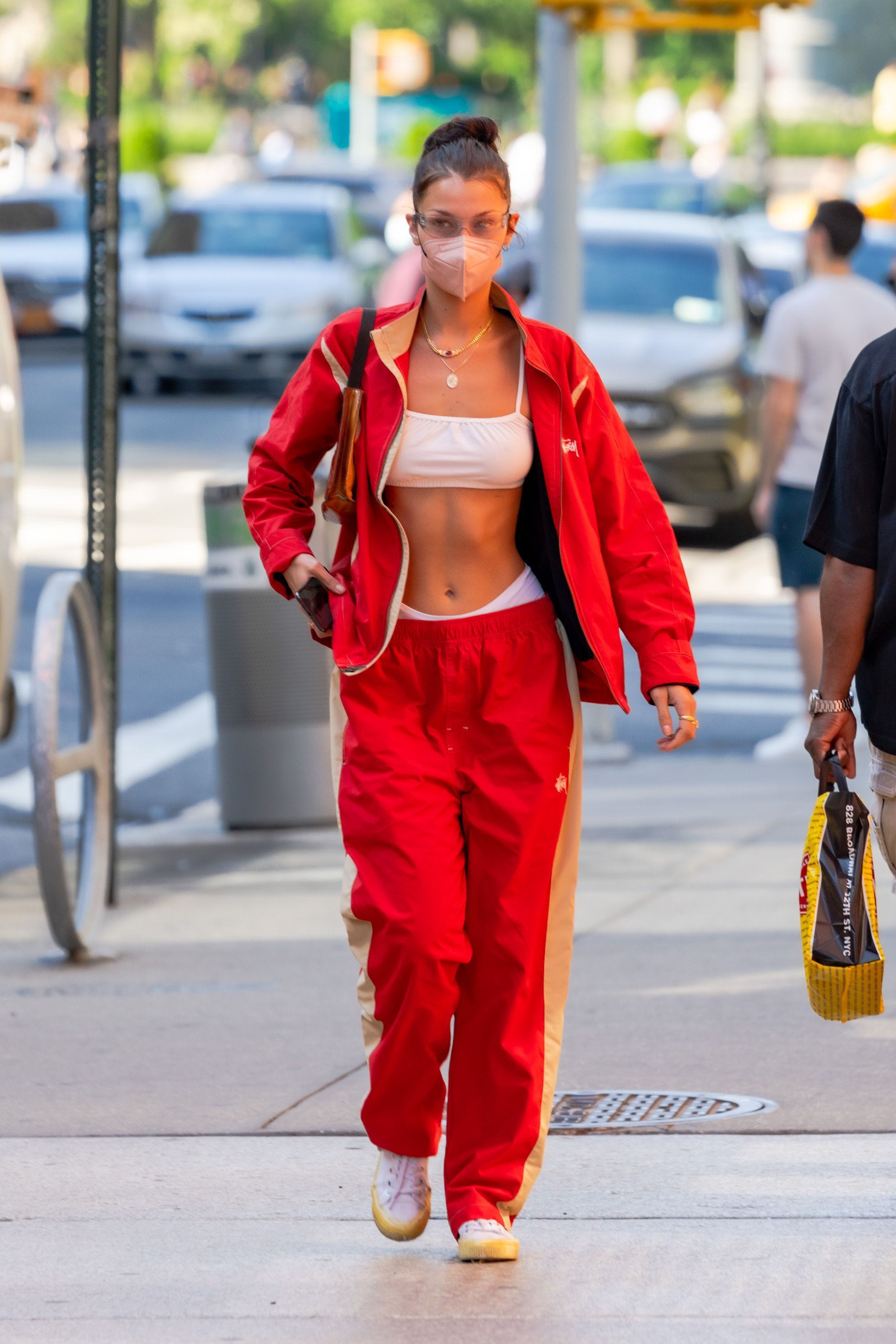 Bella Hadid Showed Off Her Abs in a Sports Bra and Red Track Suit