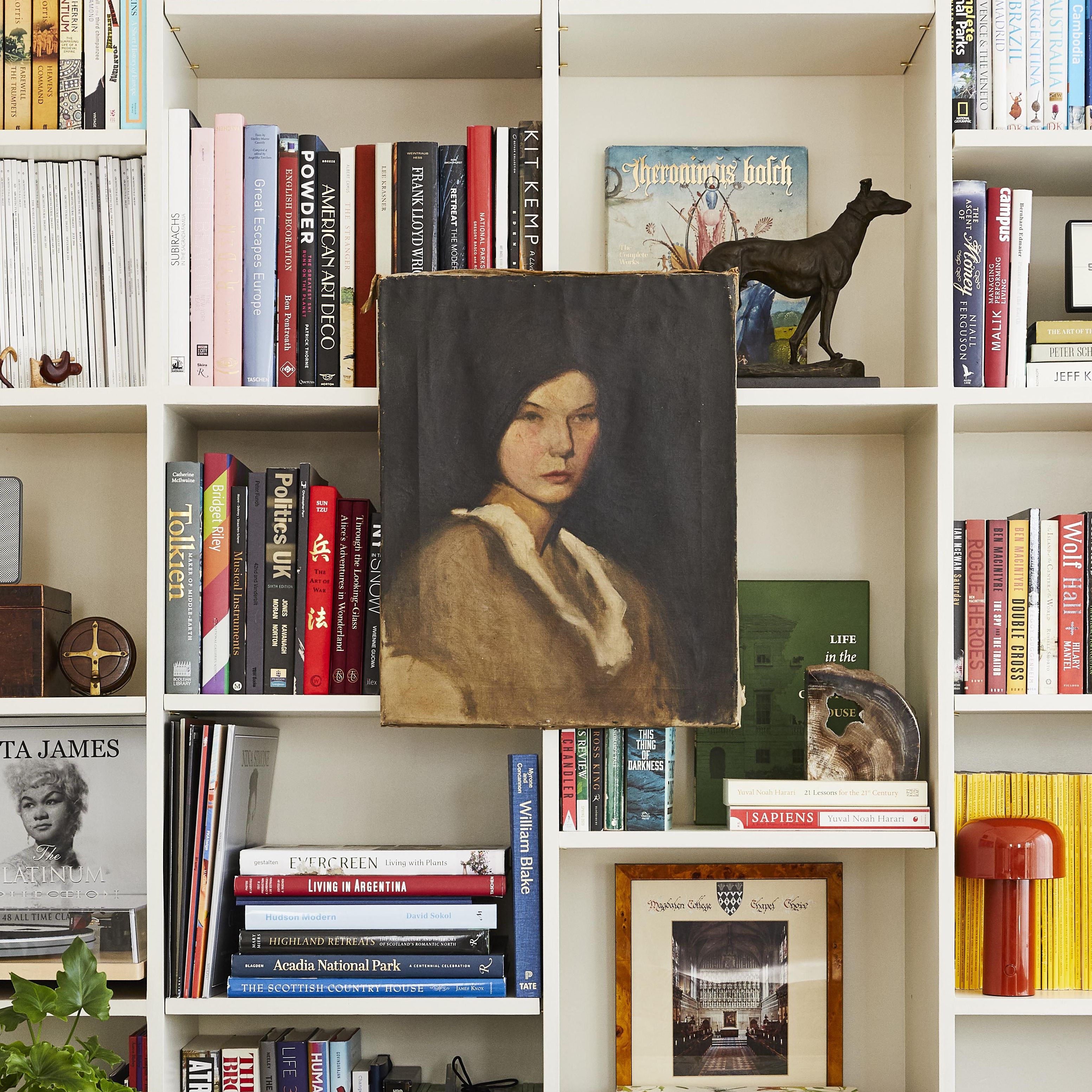Hang Art on Your Bookshelves Using These Designer-Approved Tips