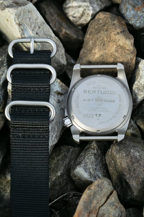 watch case band and strap on rocks