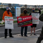 Union Push At Amazon Warehouse In Alabama Reaches Final Day Of Vote bessemer, al march 29 a supporter of the rwdsu unionization effort takes a photo of the rwdsu union rep standing with other supporters outside the amazon fulfillment warehouse at the center of a unionization drive on march 29, 2021 in bessemer, alabama employees at the fulfillment center are currently voting on whether to form a union, a decision that could have national repercussions photo by elijah nouvelagegetty images