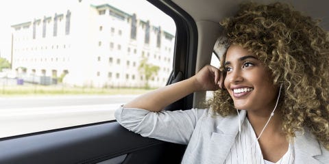 woman listening to podcast