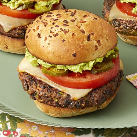 chipotle black bean burgers on sage green plate