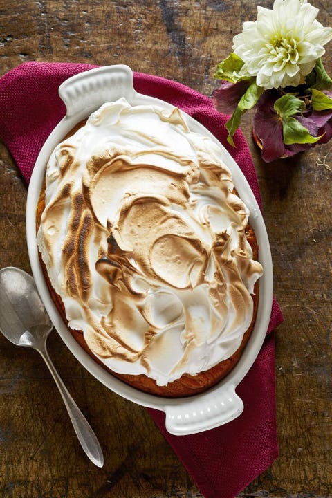 sweet potato casserole with toasted marshmallow topping in an oval baking dish