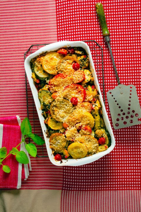 squash pepper and tomato gratin in a white loaf pan