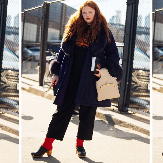 a model wears a pair of clogs in a roundup of the best clogs 2022