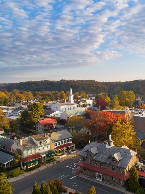 aerial view of small town lambertville, new jersey with fall foliage