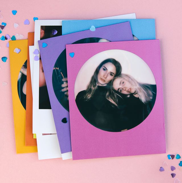 polaroid photos of friends with confetti