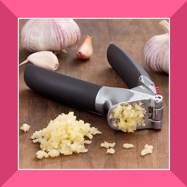 garlic presses crushing garlic cloves