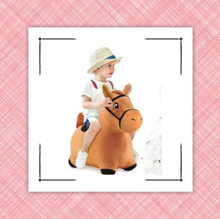 raincoat and boy riding inflatable horse