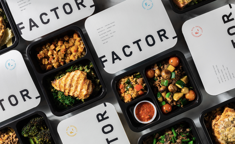 an assortment of prepared meals in meal prep containers from factor, a good housekeeping pick for best meal delivery service