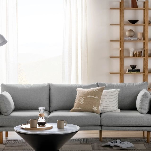 a grey couch in a living room