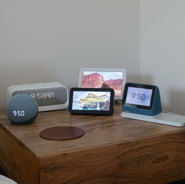 5 smart alarm clocks on a bed side table