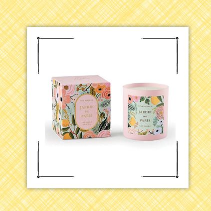 pink candle with floral label and green candle