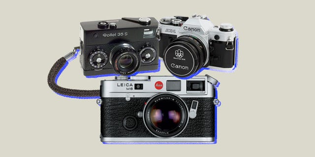 https://hips.hearstapps.com/hmg-prod.s3.amazonaws.com/images/best-vintage-film-cameras-refresh-lead-650de2dd54d04.jpg?crop=0.502xw:1.00xh;0.251xw,0&resize=640:*