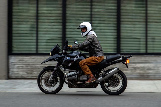 a man riding on a motorcycle