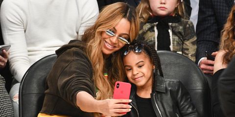 Beyonce and Blue Ivy sat courtside