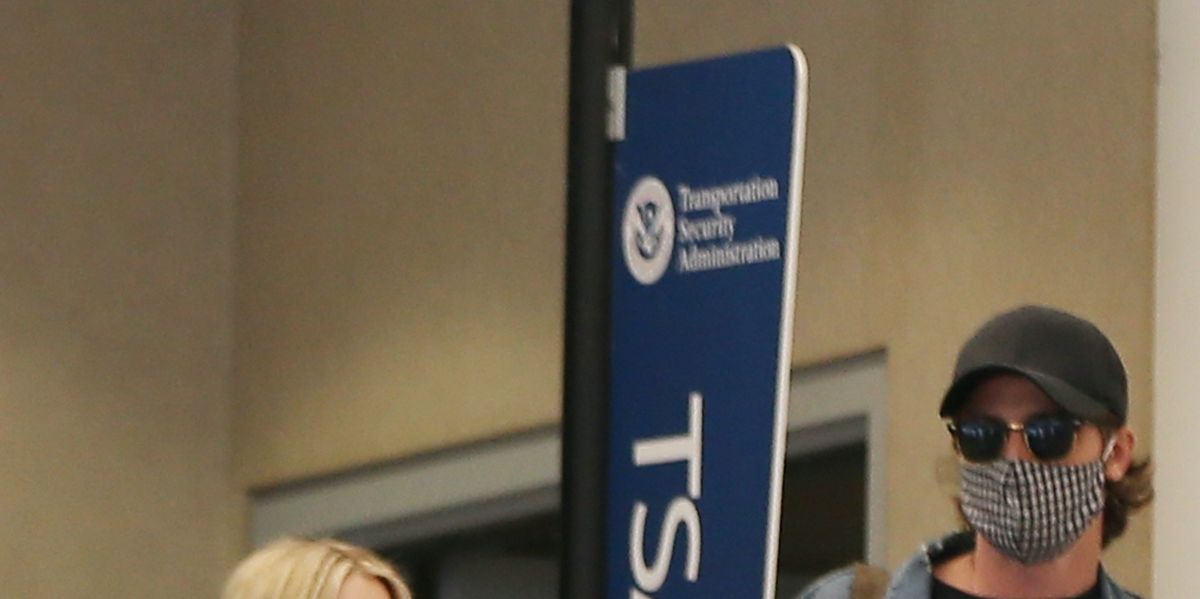 Pregnant Emma Roberts Garrett Hedlund Photographed At Airport