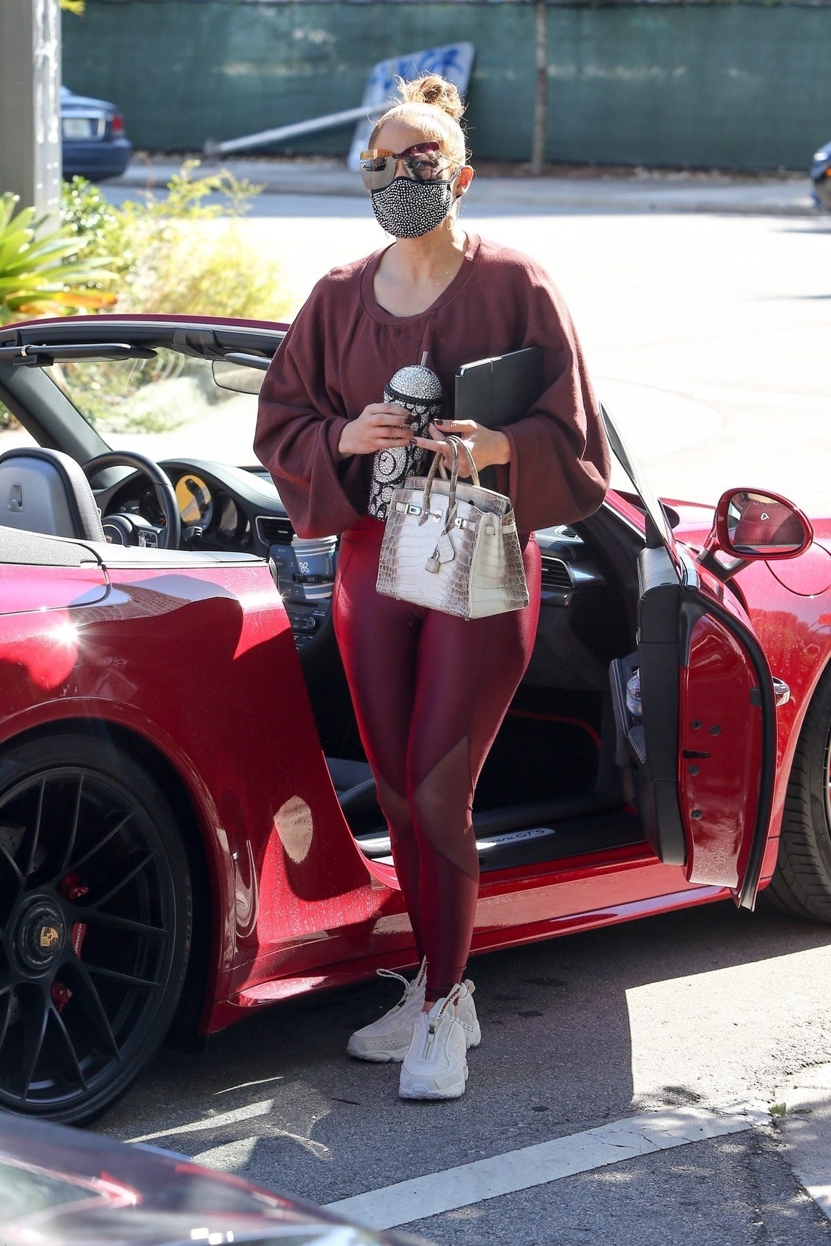 J.L. takes his Hermes Himalayan crocodile Birkin to the gym