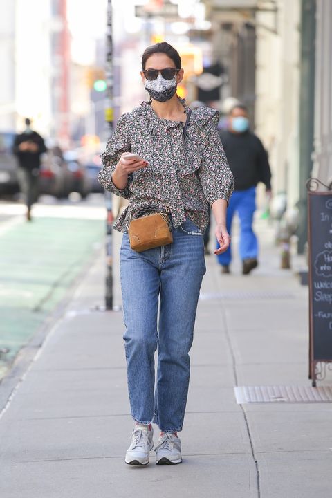 Katie Holmes Looks Stunning in a Floral Blouse, Jeans & Sneakers