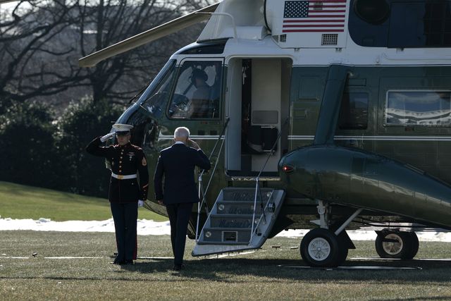 washington, dc   january 11 us president joe biden salutes as he boards marine one on the south lawn of the white house on january 11, 2022 in washington, dc president biden is visiting atlanta, georgia, along with us vice president kamala harris and several lawmakers to deliver remarks on passing further voting rights legislation biden will also make stops at the king center and ebenezer baptist church photo by anna moneymakergetty images