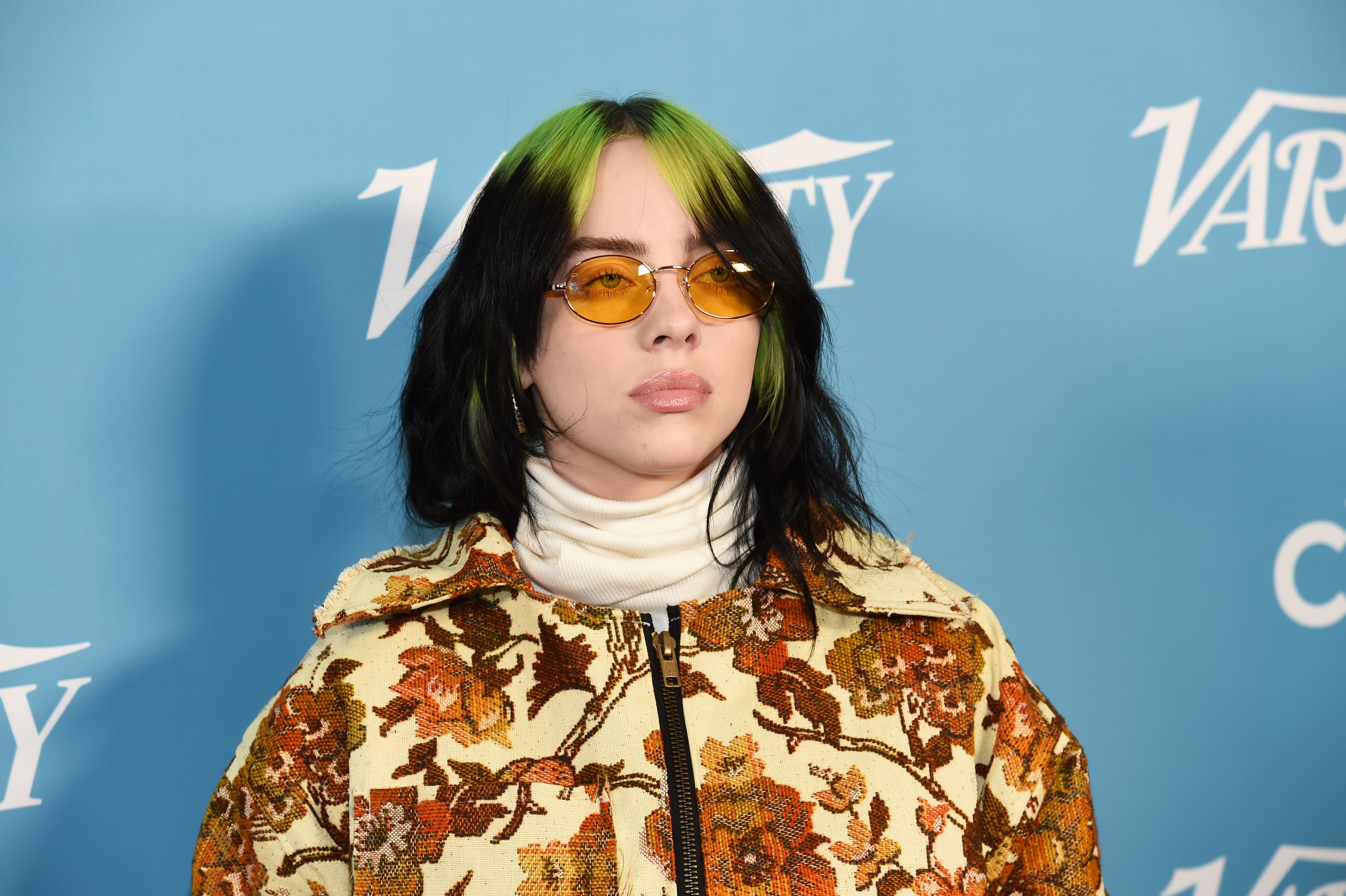 Billie Eilish's iconic blue hair and outfit - wide 3