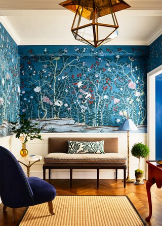 entryway with mural wallpaper