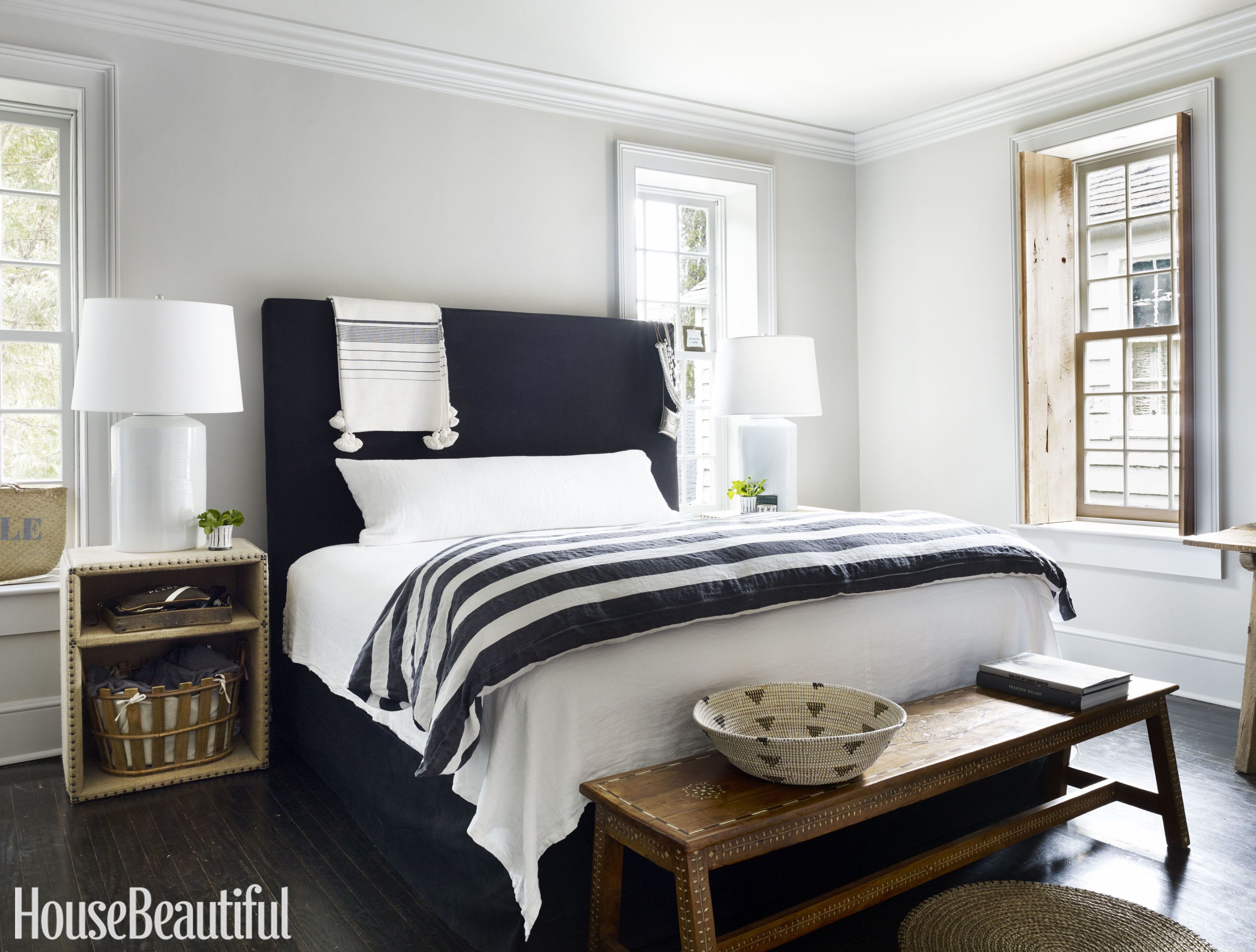 black bedroom walls with white furniture