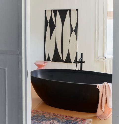 black freestanding bathtub, abode living, abstract black and white wall hanging