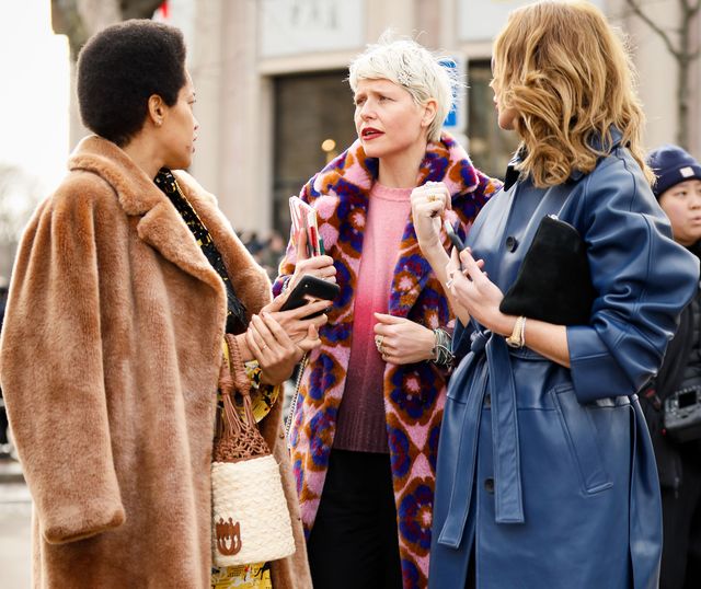 paris, france   march 03 tamu mcpherson wearing fluffy coat, yellow skirt white net bag and n21 shoes outside the miu miu show during paris fashion week womenswear fallwinter 20202021 day nine on march 03, 2020 in paris, france photo by hanna lassengetty images