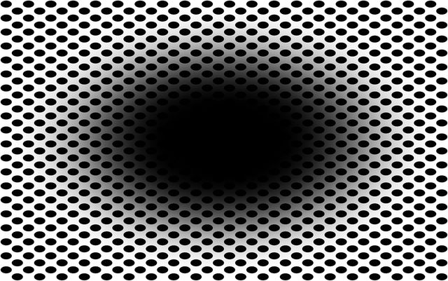 black hole illusion with darkness in center and black dots surrounding it
