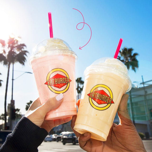 friends cheers ing with shakes from fatburger