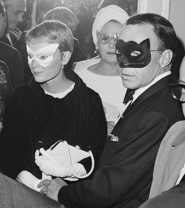 frank sinatra and his wife, actress mia farrow, as they arrive at truman capote's black and white ball