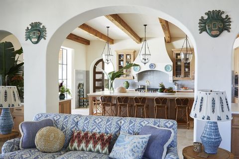 sea island, georgia home by sara gilbane and thad truett kitchen addison mizner–inspired beams and hand forged iron bell jar lighting by formations balance the kitchen’s shimmering tilework mosaic house countertops,
caesarston
