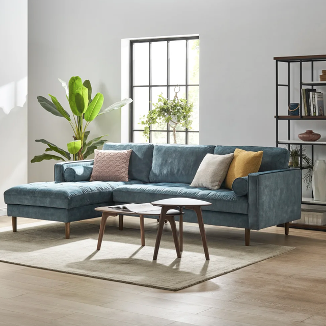 Light blue velvet sofa in the living room