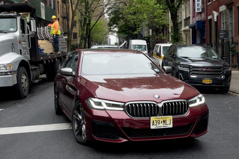 bmw m550i maroon red 2021
