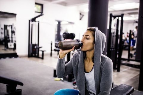 girl drinks protein shake