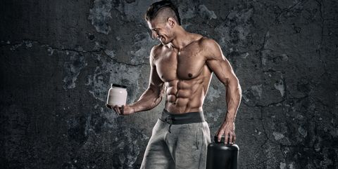 Bodybuilder with supplements