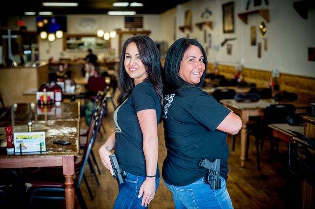 owner lauren boebert, left, poses for a portrait with her mother, shawna bentz, at shooters grill in rifle, colorado on april 24, 2018   lauren boebert opened shooters grill in 2013 with her husband jason in the small town of rifle, colorado, the only city in the united states named after a gun according to them shortly after boebert opened the restaurant, there was a murder in the alley behind it boebert went next door to the tradesmen gun store and pawnshop to speak to the owner, edward wilks wilks explained to her that you dont need a permit in the state of colorado to open carry the next day she started carrying a gun with her the majority of her staff carries, while it is not a requirement to work there she encourages them to do so if they feel comfortable with it customers are also welcome to carry firearms on them as well the restaurants theme remained heavily country western but revolves alot around the theme of the second amendment as well photo by emily kask  afp        photo credit should read emily kaskafp via getty images