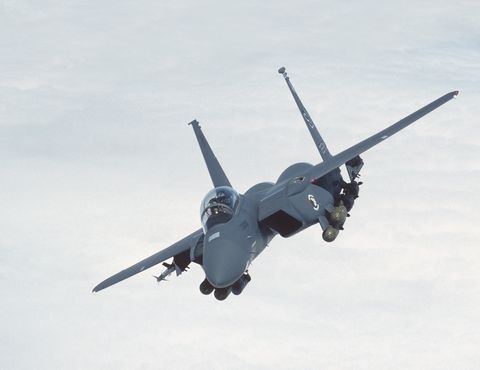 boeing-f-15e-strike-eagle-flying-enroute-above-a-layer-of-news-photo-973343852-1550605754.jpg