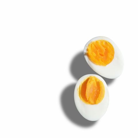 boiled egg with shadow on white background