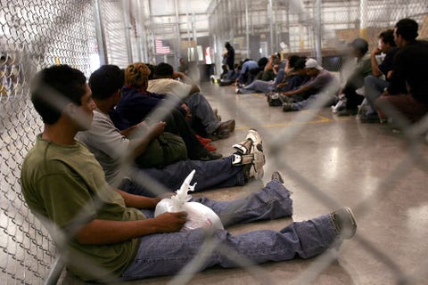 nogales, az   june 21  men who were caught crossing the us border with mexico illegally wait in a holding cell on june 21, 2006 at the us border patrol processing center in nogales, arizona us president george w bush plans to deploy a total 6,000 national guard soldiers in the four southern border states in an attempt to mitigate illegal immigration into america detentions along the us mexico border decreased by 21 percent to 26,994, in the first 10 days of june according to us authorities compared  photo by spencer plattgetty images