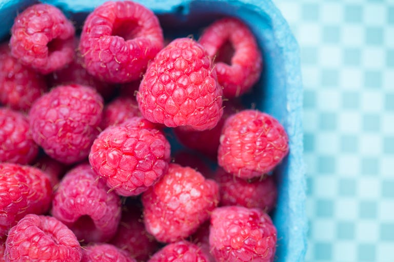 Box of fresh raspberries