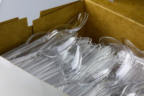 box of plastic eating utensils for carry out dinning